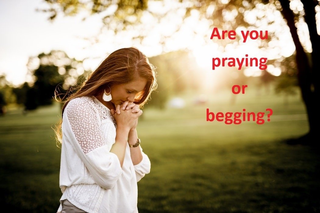 praying or begging